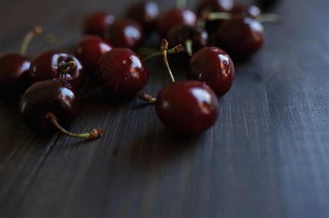 Premium Photo Close Up Of Cherries On Table Fruit Fresh Vege