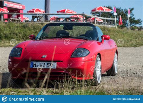 Front View Of Red Fiat Barchetta Roadster Parked At The Top Of The