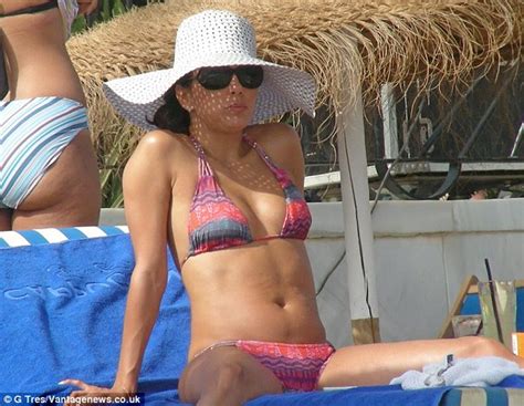 Eva Longoria Shows Off Her Toned And Tanned Bikini Body In A Skimpy Pink Two Piece As She