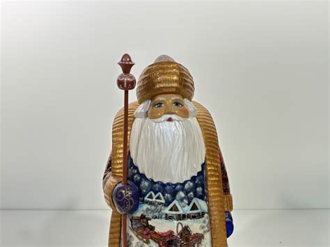 A Hand Carved And Painted Russian Santa Auctionninja