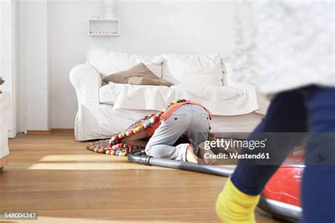 Vacuum Under Furniture Photos and Premium High Res Pictures - Getty Images