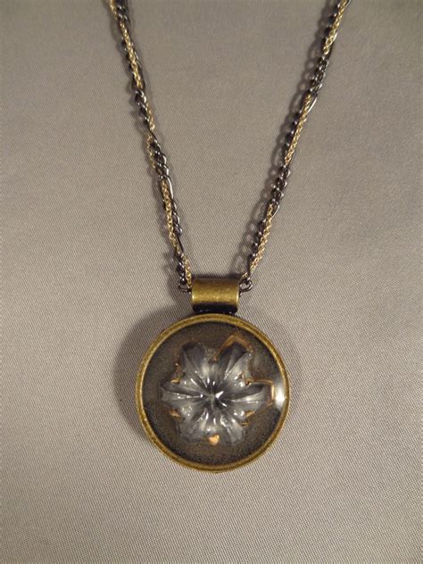 Expanded Hollow Point Pendant 45 Caliber Bullet In Round Base