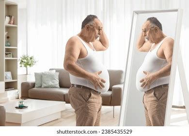 Shocked Mature Man Holding His Big Stock Photo 2384662625 Shutterstock