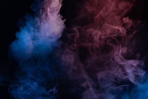 Premium Photo | Blue and pink steam on a black background