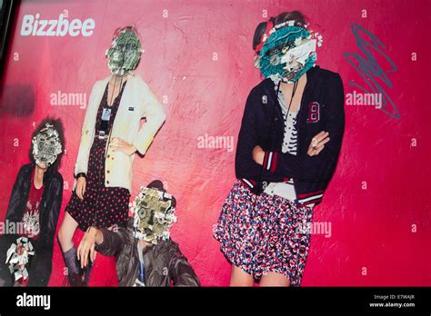 A defaced poster in Rouen, France Europe Stock Photo - Alamy