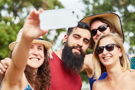 Friends Taking Selfie Together By Stocksy Contributor Guille