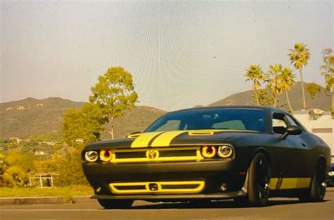 Cobra Kai Car Black And Yellow Car Driving With Palm Trees