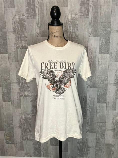 This vintage-inspired Free Bird Graphic Tee is essential for adding a ...