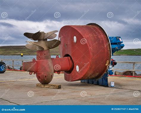 A Large, Red, Twin Propellor - Twin Azimuth Thruster Unit on the Quay ...