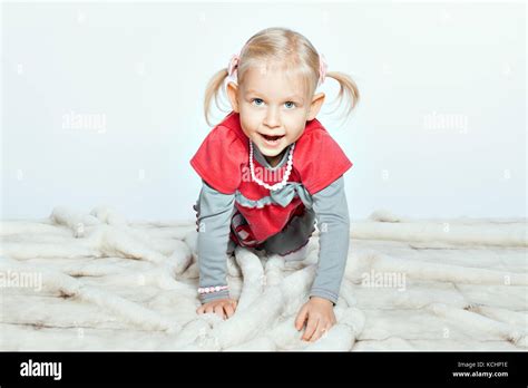 Baby Blond Girl Crawling On Coverlet Girl Opened Her Mouth Stock Photo