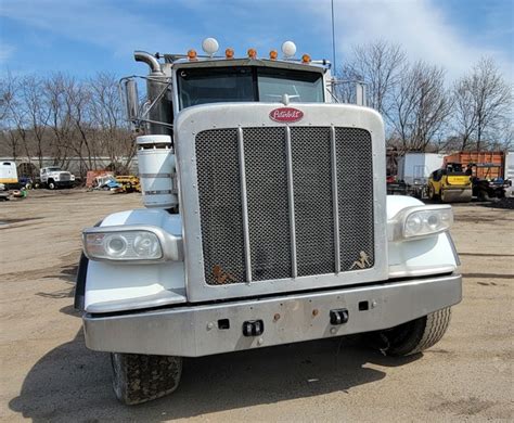 2011 Peterbilt 388 Tri Axle C13 8LL J J Aluminum Box W Chute