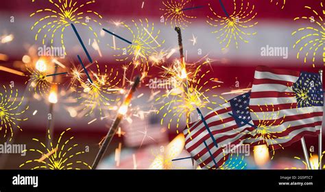Composition Of Sparklers And Flags Over American Flag Stock Photo Alamy