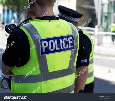 Police Officer On Duty On City Stock Photo 651846148 | Shutterstock