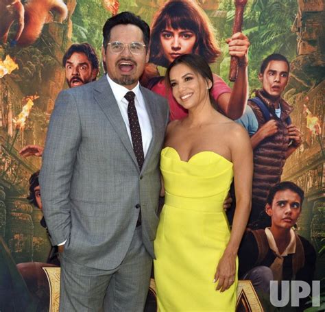 Photo: Michael Pena and Eva Longoria attend the "Dora" premiere in Los ...