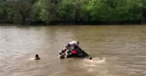 Dramatic Video Shows Strangers Diving Into River To Save Trapped Driver