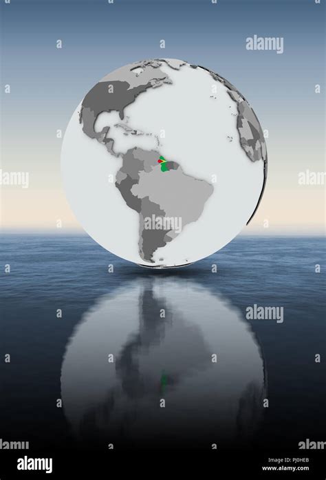 Guyana With Flag On Globe Above Water 3D Illustration Stock Photo Alamy