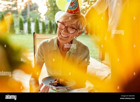 Smiling Mature Woman Holding Plate Cake Birthday Garden Party Hi Res Stock Photography And