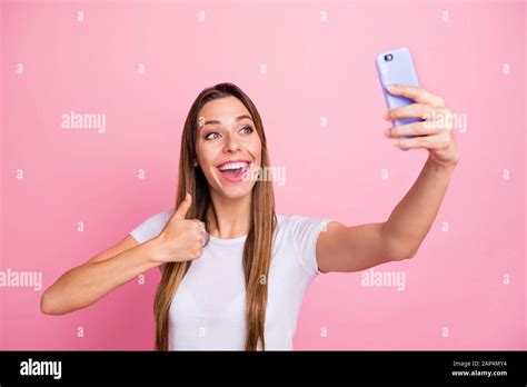 Photo Of Beautiful Lady Holding Telephone Taking Selfies Raising Thumb