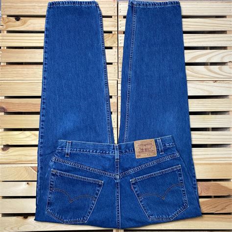 Vintage Levi's 550 Dark Wash Relaxed Fit Denim Jeans... - Depop