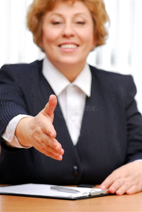 Mature Female Doctor With Group Colleagues Stock Photo Image Of