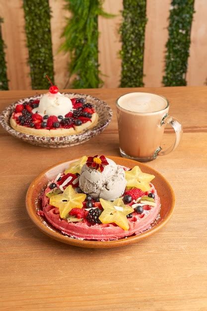 Premium Photo Delicious Pink Ice Cream Waffle With Red Fruits And