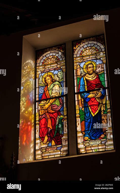 Sun Light Streaming Through Stained Glass Windows With Pictures Of