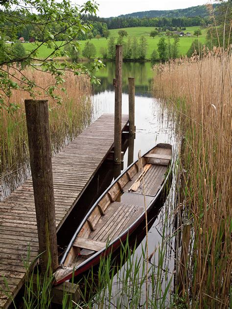 Canoe At Pond Jetty By Steve Waters