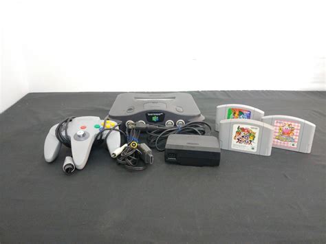 【やや傷や汚れあり】 任天堂nintendo64 本体 Nus 001ゲームソフト3本おまけ付きセット スマブラ星のカービィポケモン