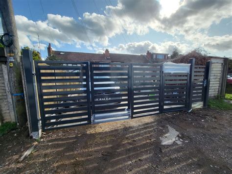 Automatic Bi Fold Gate P Lewandowski Fence Builder Limited