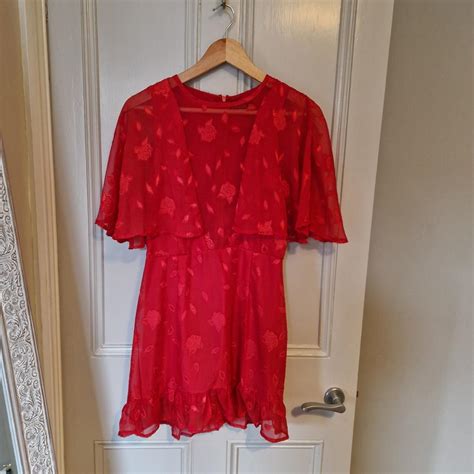 Red mini dress with cape sleeves Plunge... - Depop