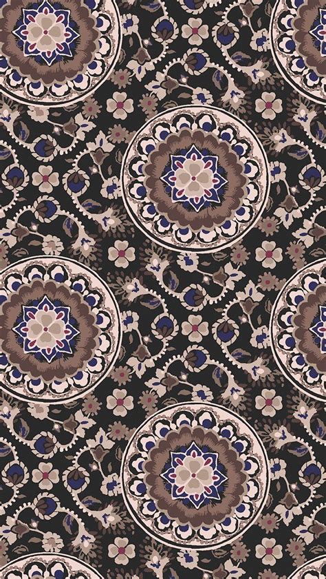 An Ornate Pattern With Blue Brown And White Flowers On Black