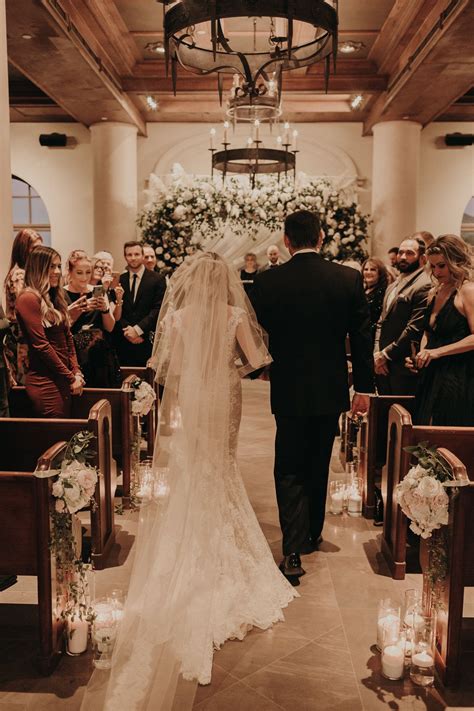 Bride Walking Down The Aisle Florals By Layers Of Lovely Photography