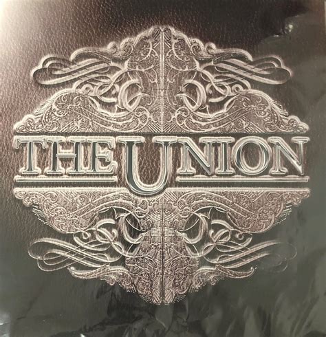 the union logo is shown on a black leather cover with silver foil and ...