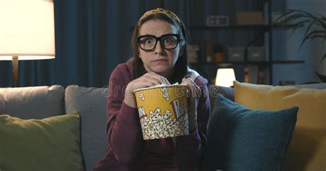 Woman Watching a Scary Movie Alone Stock Photo - Image of popcorn ...