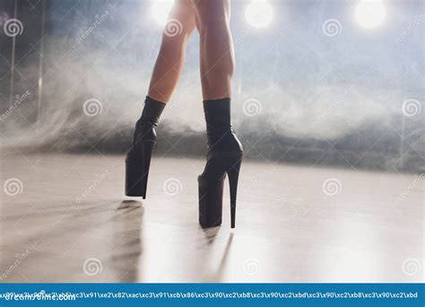 Young Striptease Dancer Moving In High Heels Shoes On Stage In Strip Night Club Pole Dancing