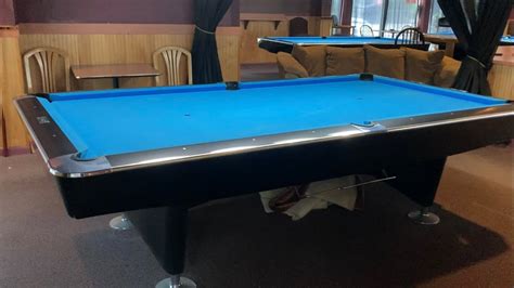 BRUNSWICK BLACK CROWN 8 FOOT POOL TABLE WITH BLUE CLOTH FELT CLOSER