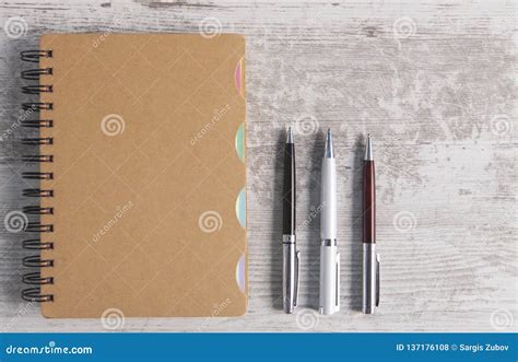 Notebook And Pen In Wooden Background Stock Photo - Image of office, paper: 137176108