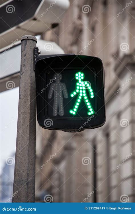 Pedestrian Green Traffic Light On Building Facade Background Royalty