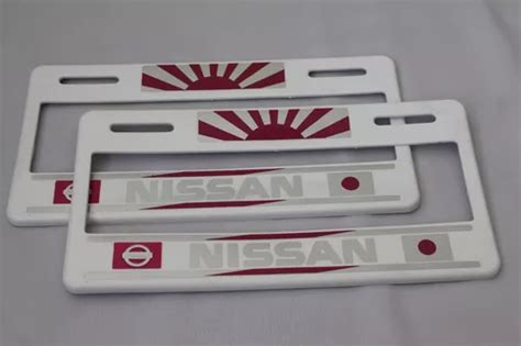 Juego Porta Placas Ancho Nissan Blanco Rosa Decorado 2pza Cuotas Sin