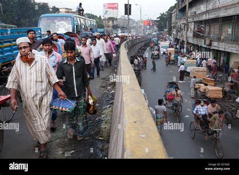 People Walk In A Crowded And Busy Street Of Dhaka Bangladesh