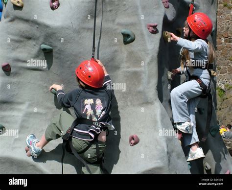 Kids on a climbing wall Stock Photo - Alamy