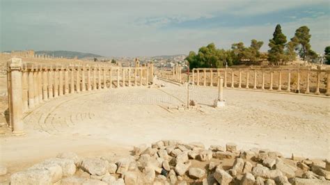 Wide Screnn View Of Ionic Columns Situated In Oval Plaza Jerash