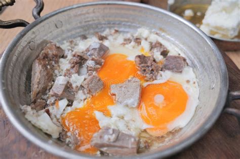 Turkish Scrambled Eggs With Roasted Meat In Copper Pan Stock Image