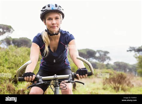 Blonde Athlete Mountain Biking Hi Res Stock Photography And Images Alamy