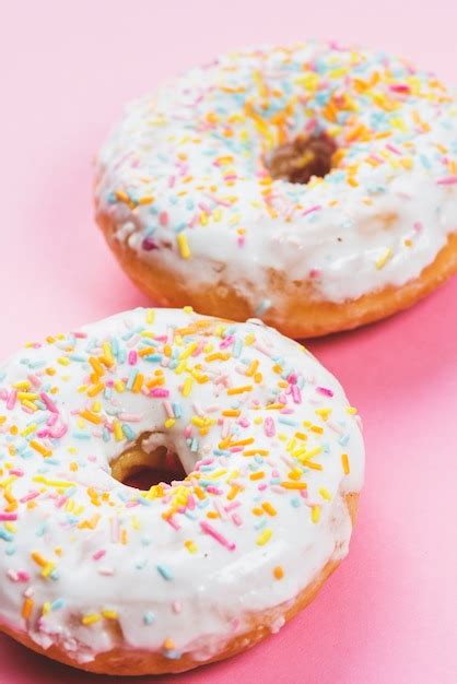 Free Photo | Round iced doughnuts topping with colorful decoration