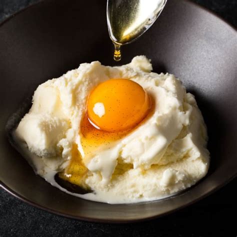 Salted Bourbon Caramelcured Egg Yolks With Vanilla Ice Cream America