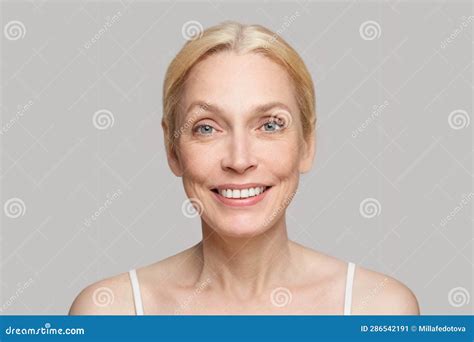 Portrait Of Happy Blonde Mature Woman With Shiny Skin With Mimic Wrinkles Stock Image Image Of