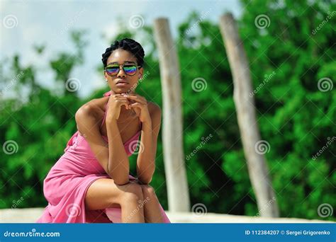 African American Girl With Dreadlocks Wearing Sunglasses Pink Dress