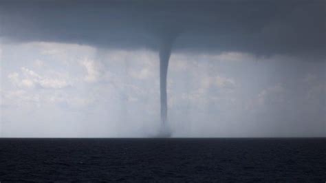 Huge Waterspout Hits Italys South Western City Bbc News