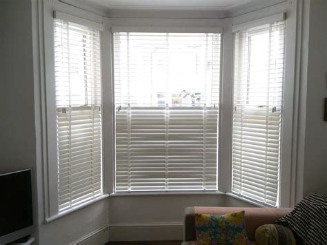 Chalk wood venetian blinds in bay window | Brighton | Curtains with ...